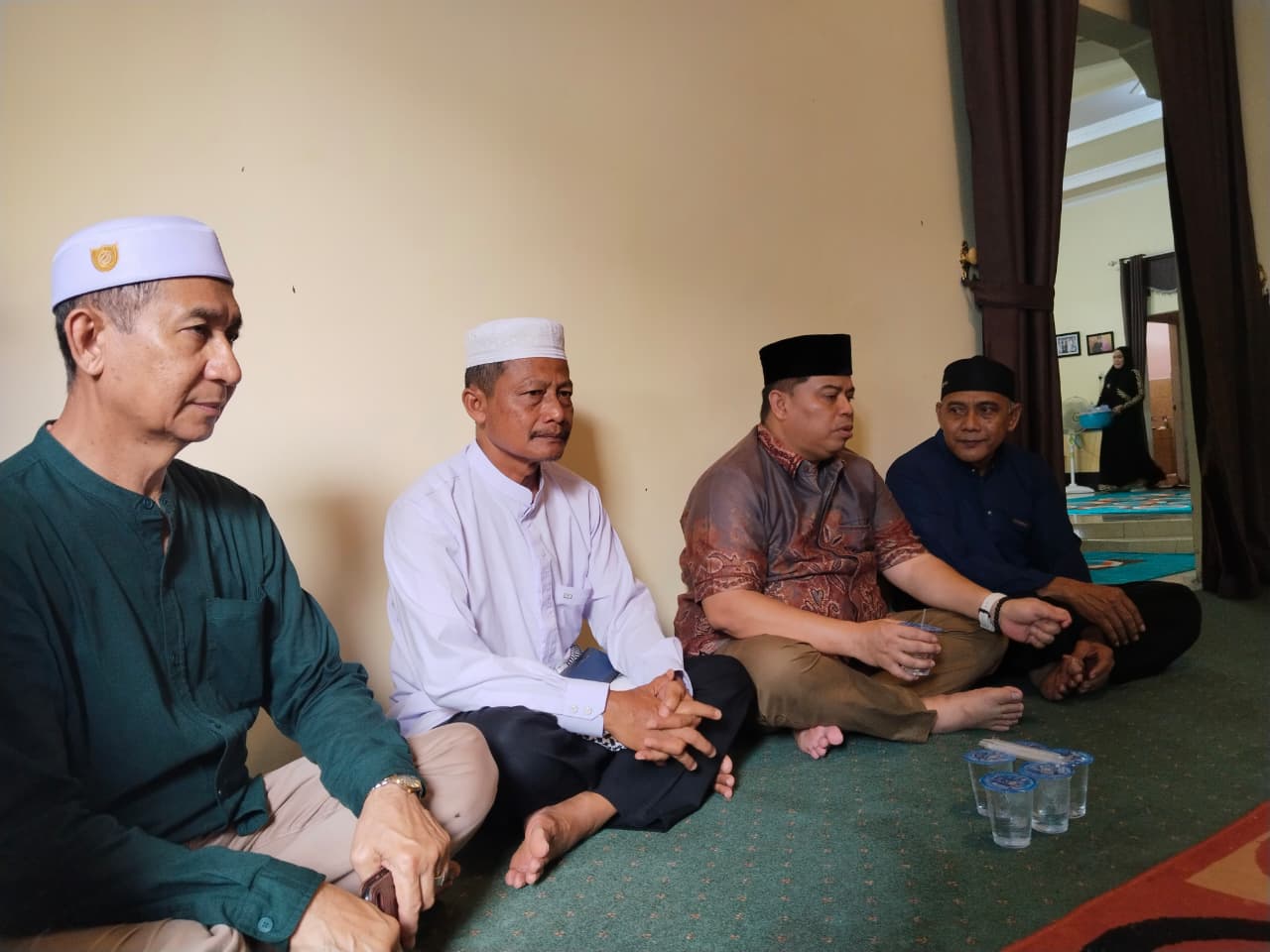 melayat